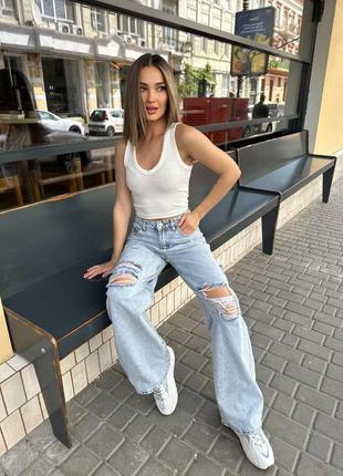 Стильные джинсы женские багги с разрезами спереди и сзади4 фото