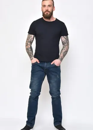 Класичні джинси з потертостями