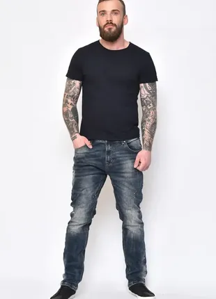 Джинси з потертостями