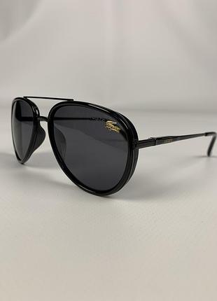 Сонцезахисні окуляри lacoste
