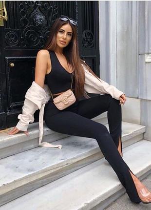 Чорні замшеві брюки лосини з розрізами