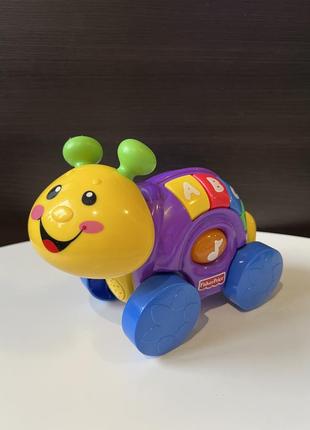 Музична каталка равлик fisher price