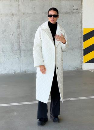 Стеганое дутое пальто под пояс на запах