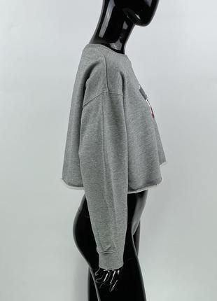 Укороченный оверсайз-свитшот бег лого пайетки