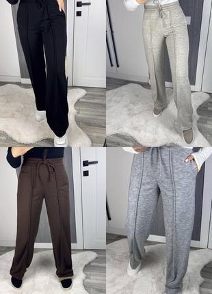 Брюки прямого свободного кроя, с карманами, талия на резинке и веревке