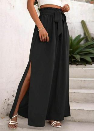 Штани жіночі чорні однотонні на високій посадці вільного крою з розрізами стильні
