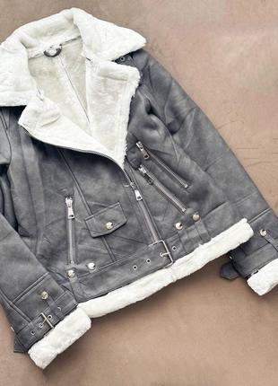 Дублянка модель середньої довжини зі штучним  хутром.