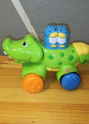 Инерционная игрушка fisher price крокодил5 фото