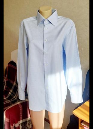 Рубашка мужская в мелкую клетку.