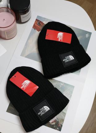 Теплі шапки the north face