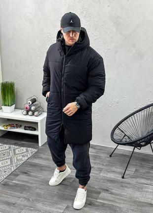 Зимний удлиненный пуховик