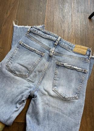 Джинсы с необработанным краем