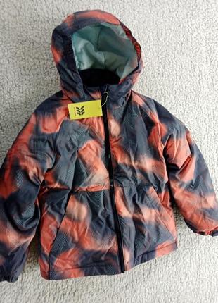 Пуховик 8 розмір.