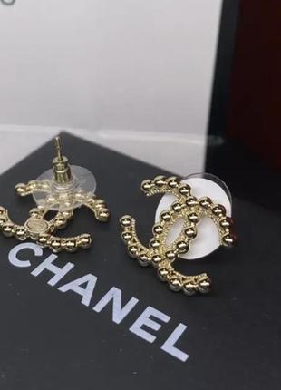 Позолоченные сережки с логотипом