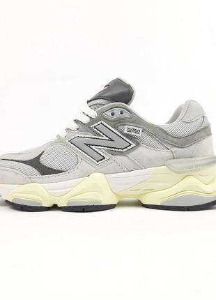 New balance 9060 сірі червоний язик