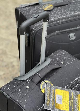Средний чемодан дорожный тканевый m польша на колесах wings с подшипником