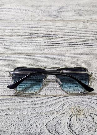 Солнцезащитные очки унисекс, голубые в  металлической серебристой  оправе ( без бренда )7 фото