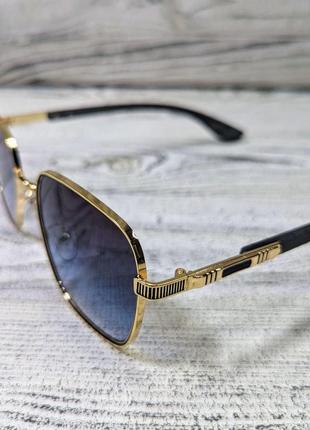 Сонцезахисні окуляри унісекс, сині в металевій золотистій оправі (без бренда)3 фото