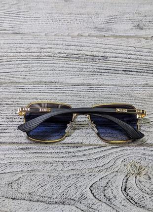 Сонцезахисні окуляри унісекс, сині в металевій золотистій оправі (без бренда)7 фото