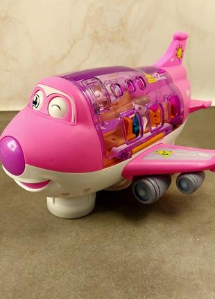 Іграшковий літак для дітей зі світлодіодними вогнями та звуками. музикальний , крутиться навколо осі6 фото