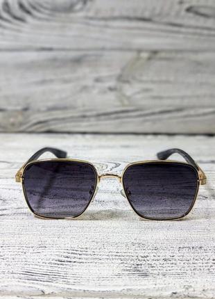 Сонцезахисні окуляри унісекс, фіолетові в металевій золотистій оправі (без бренда)2 фото