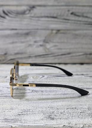 Сонцезахисні окуляри унісекс, фіолетові в металевій золотистій оправі (без бренда)5 фото