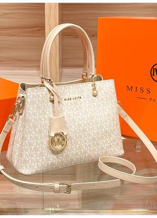 Женская кожаная бежевая сумка