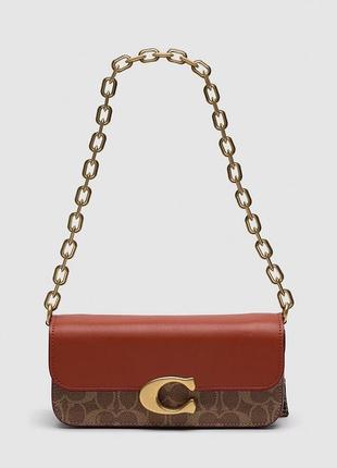 Сумка coach idol bag 23 in signature canvas with snakeskin detail