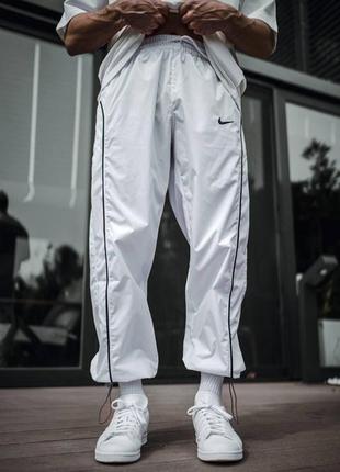 Белые брюки nike