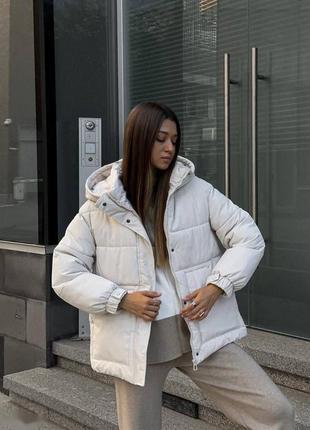 Зимова куртка жіноча з капюшоном і поясом