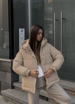 Зимова куртка жіноча з капюшоном і поясом