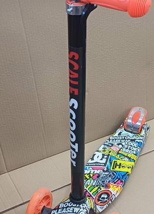 Самокат best scooter maxi жовтогарячі написи