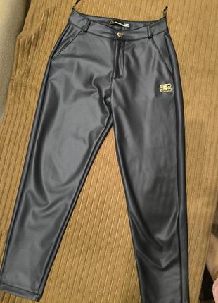 Штани з екошкіри на флісі