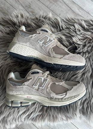 New balance 2002r driftwood3 фото