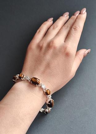 Браслет натуральне тигрове око в сріблі. браслет з натурального тигрового ока. індія.