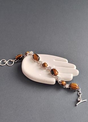 Браслет натуральне тигрове око в сріблі. браслет з натурального тигрового ока. індія.