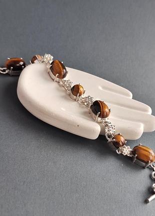 Браслет натуральне тигрове око в сріблі. браслет з натурального тигрового ока. індія.