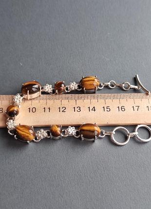 Браслет натуральне тигрове око в сріблі. браслет з натурального тигрового ока. індія.