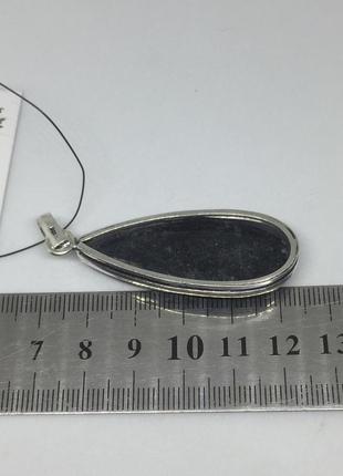 Ортоцерас окаменелый кулон натурального окаменелого ортоцераса индия.