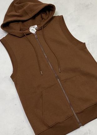 Женская жилетка
