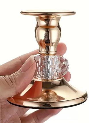 Золотистый металлический подсвечник с кристальной вставкой