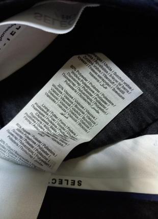 Узкие зауженные брюки со складками из трикотажа модели «джим» темно-синего цвета.7 фото