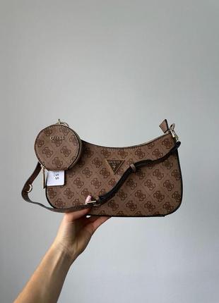 Сумка guess з гладкої шкіри з фірмовою канвою.