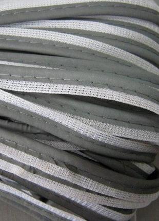 Кант светоотражающий пришивной (нашивка) тесьма  (ширина 10 мм) серо-белый цвет (цена за 1м)