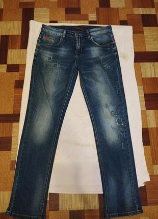 Джинсы галоши внизу немного потертые последующее фото,или женские или мужские,