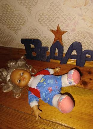 Мягкая красивая кукла спяча