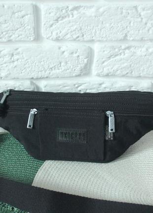 Стильна поясна сумка бананка hedgren.