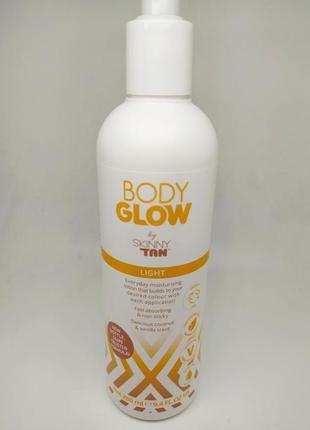 Автозасмага, щоденний зволожувальний крем із відтінком засмаги.body glow by skinny tan light lotion