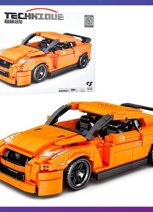 Детская машинка конструктор спортивный автомобиль 8407 инерция 908 деталей оранжевая