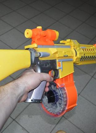 Іграшкова зброя nerf 009 бластер з барабаном для дітей із присосками3 фото
